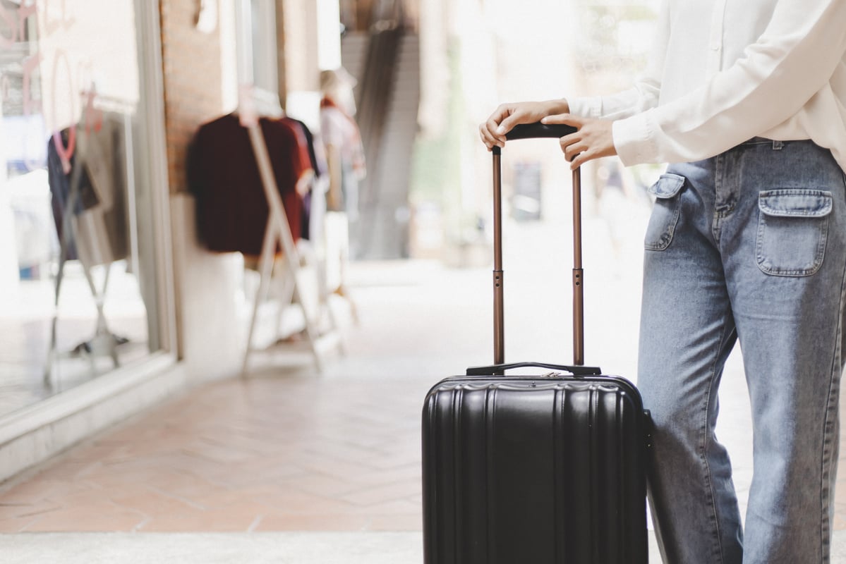 Tourist Holding a Luggage